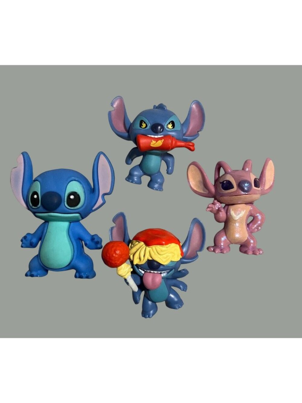 Stitch Figurine Set Of 4 Collectibles With Fun Poses and Accessories